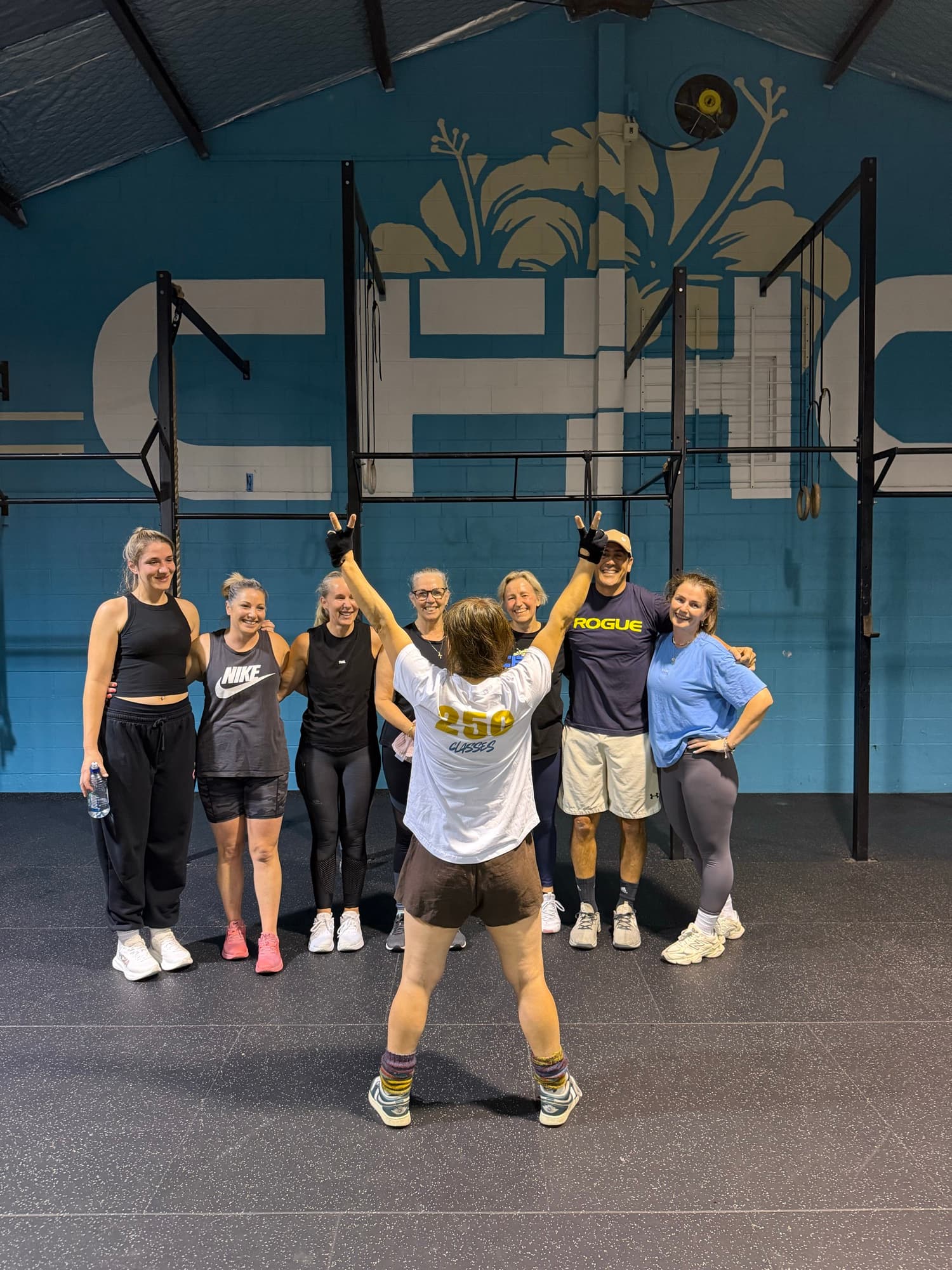 Athletes of CrossFit Hibiscus Coast celebrating together after a workout
