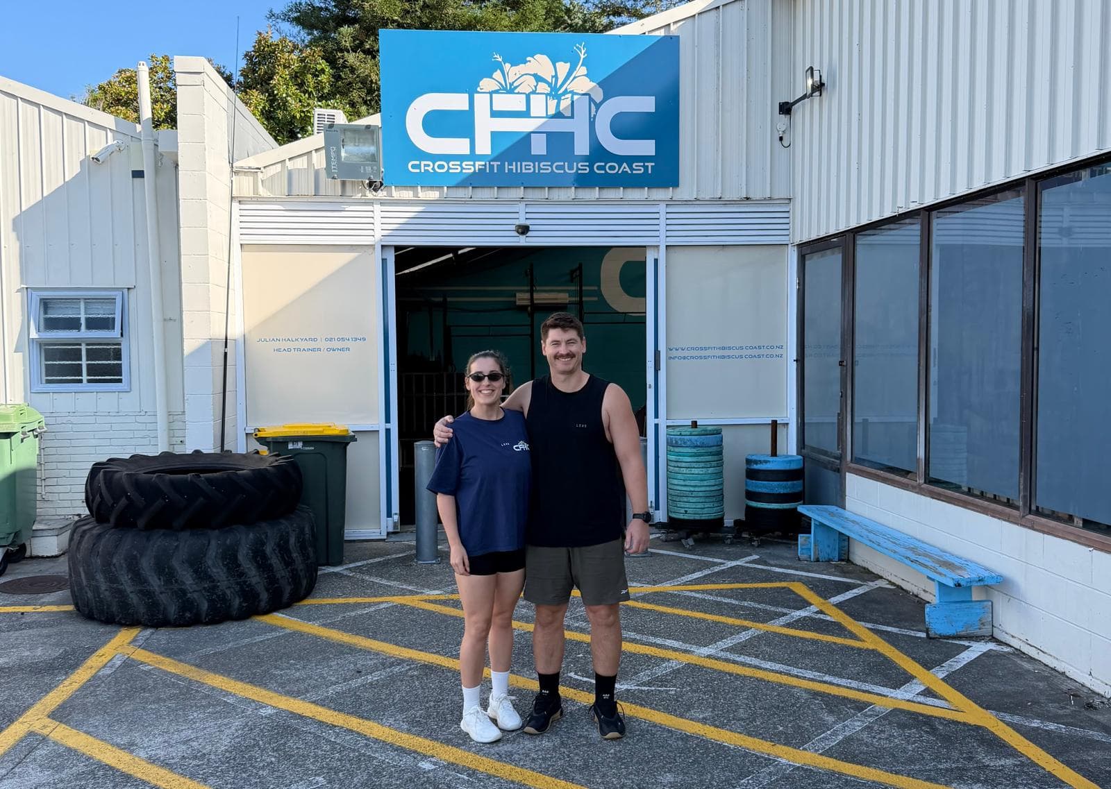 Nicole and Julz standing at the entrance of CrossFit Hibiscus Coast